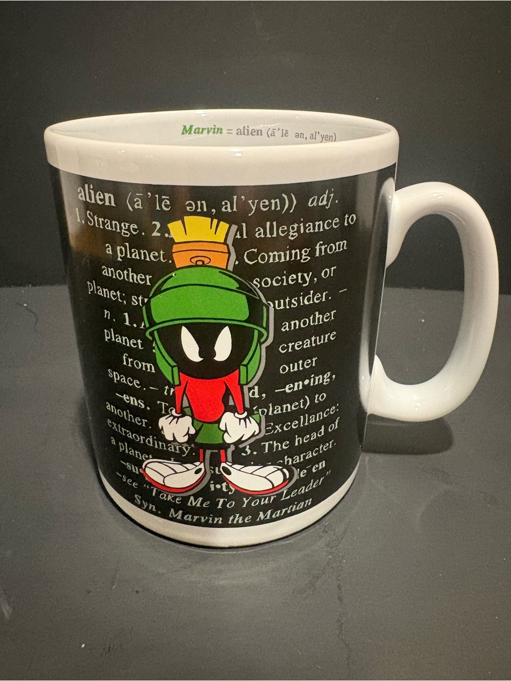 Warner Bros. Marvin the Martian Black Mug with Green & Red Artwork.